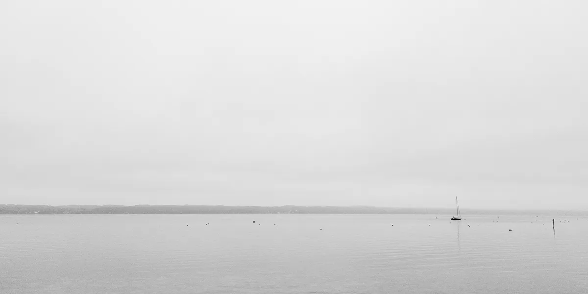 Classic boat in Fyrisån being cleaned up to prevent environmental hazard
